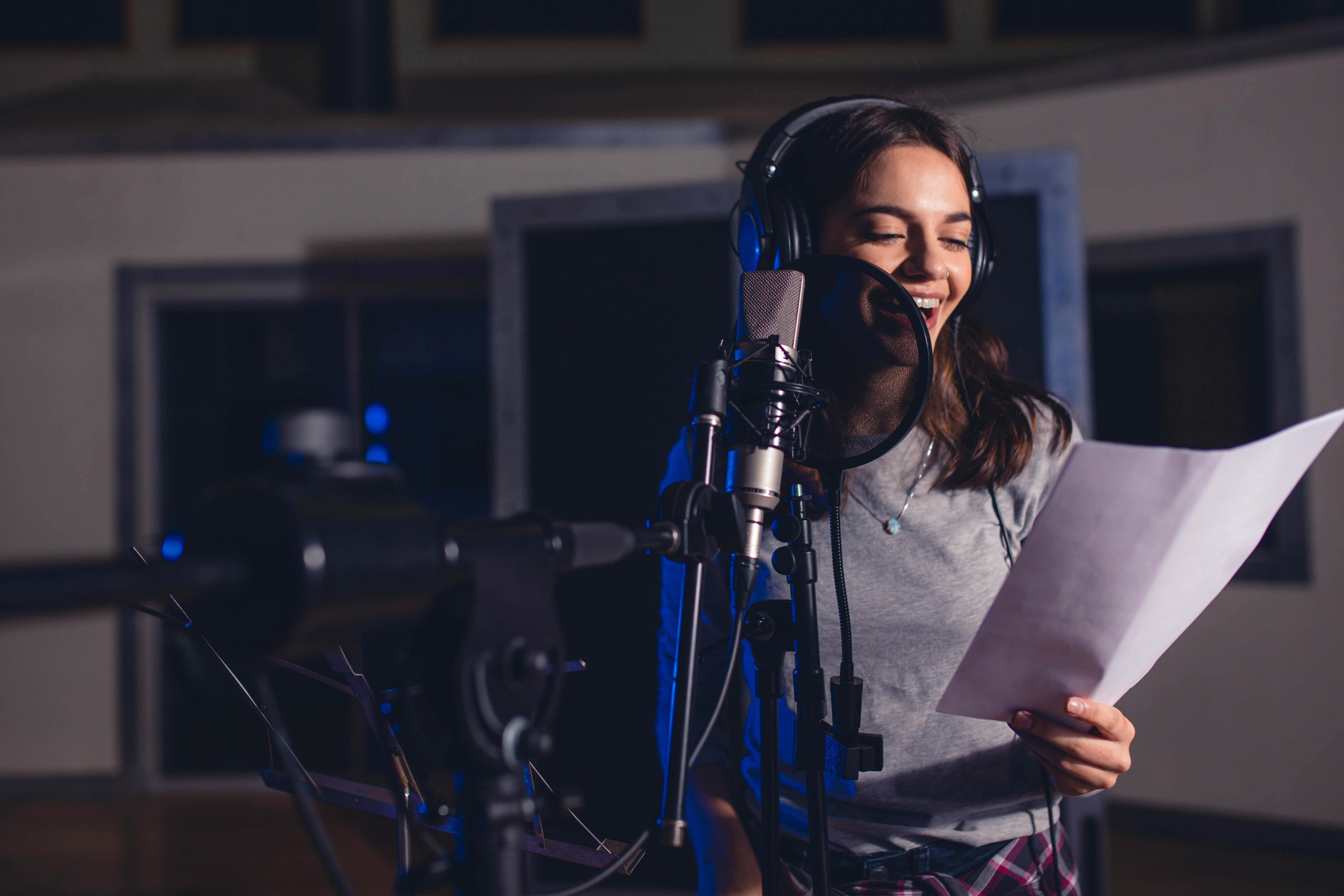 Female Vocal Artist With Microphone